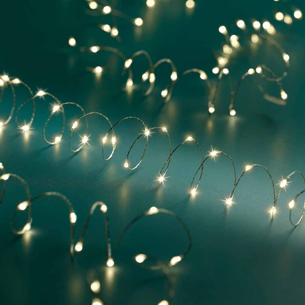 Catena luminosa a batteria 100 Micro led luce calda filo argento con giochi di luce 1