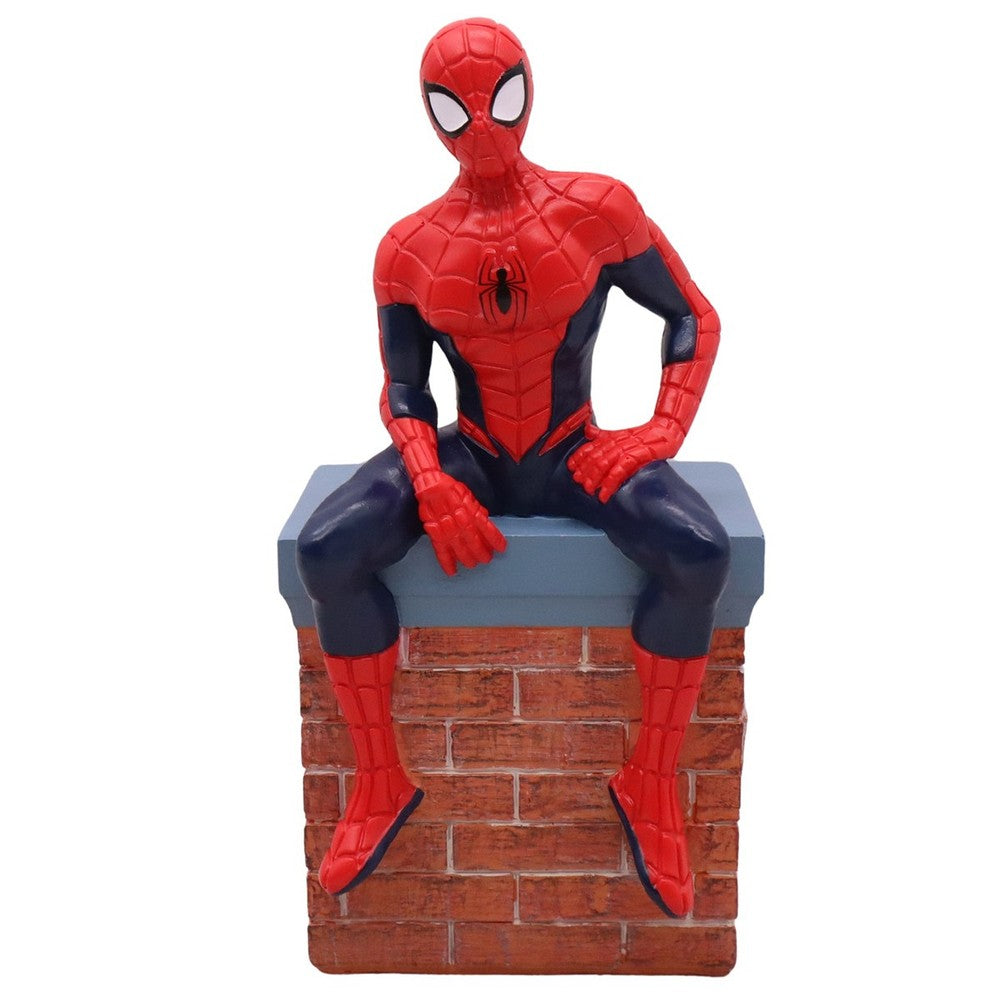 Statua decorativa natalizia Marvel Spider-Man seduto sul camino 1